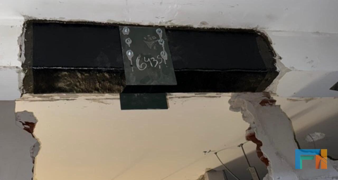 Detalhe de ancoragem num reforço estrutural